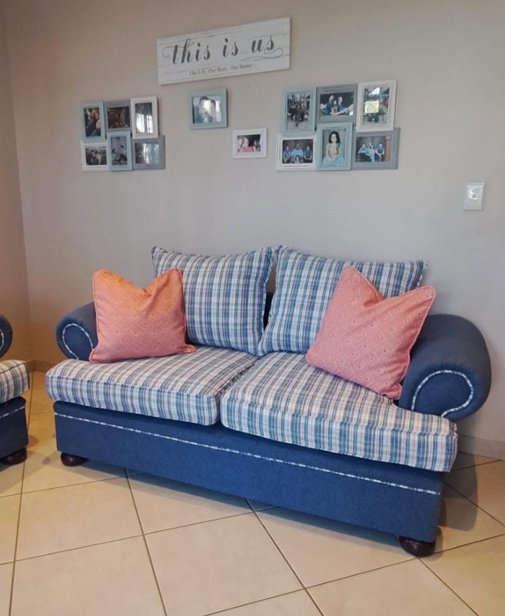 Tartan sofa suite with coral cushions